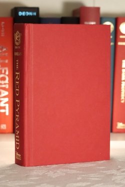 A red hardcover book.